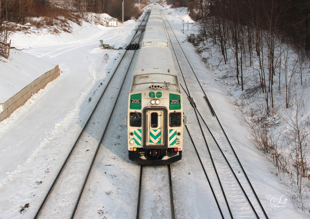 GO Transit (Government of Ontario) Control Cab #205 travelling through CN Snake on its way to Hamilton's GO Station downtown on New Year's Eve afternoon.  The trailing locomotive is GO 651.