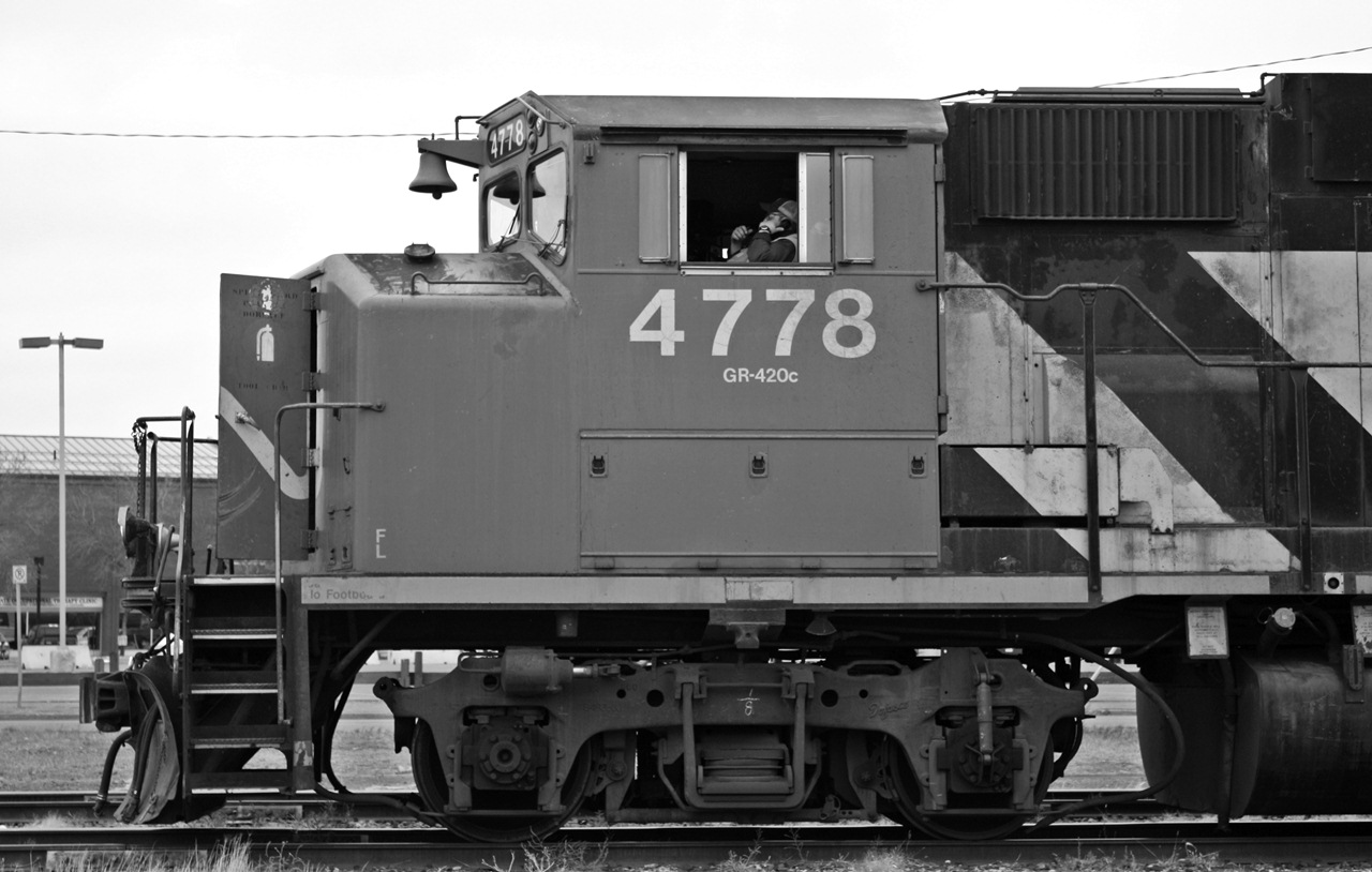 CN GP38-2W 4778 is ready to depart Brandon with a oil train for Steelman Sk after the conductor gets his paperwork setup and makes a few calls for OCS Clearances then they are off. Always been a fan of the early wide cabs on the Geeps and SD40-2W's.