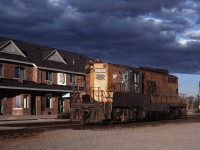 ONR 1605 resting while a nasty storm moves in. A short time before, 1605 was kicking cars in the yard, and the GP9's 567 was just screaming. You can hear this baby roaring in my You tube video link below.  Cochrane, ONT.   9/13/1999

http://www.youtube.com/watch?v=K1auERUXODs