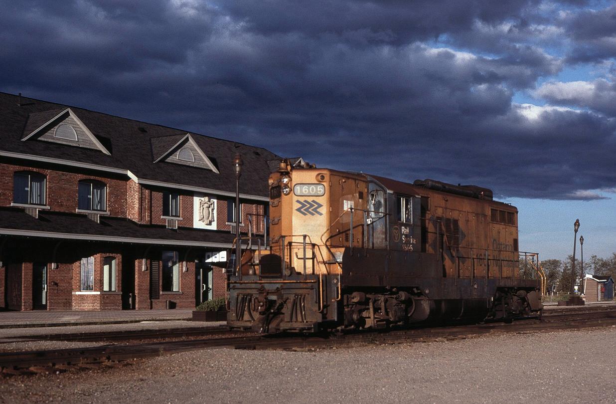 ONR 1605 resting while a nasty storm moves in. A short time before, 1605 was kicking cars in the yard, and the GP9's 567 was just screaming. You can hear this baby roaring in my You tube video link below.  Cochrane, ONT.   9/13/1999

http://www.youtube.com/watch?v=K1auERUXODs