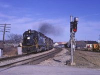 Penn Central 3123, with U.S. bound train LS3, charges westward through the elevated curve at mile 210.56 on the much storied CASO Sub April 12, 1970. 