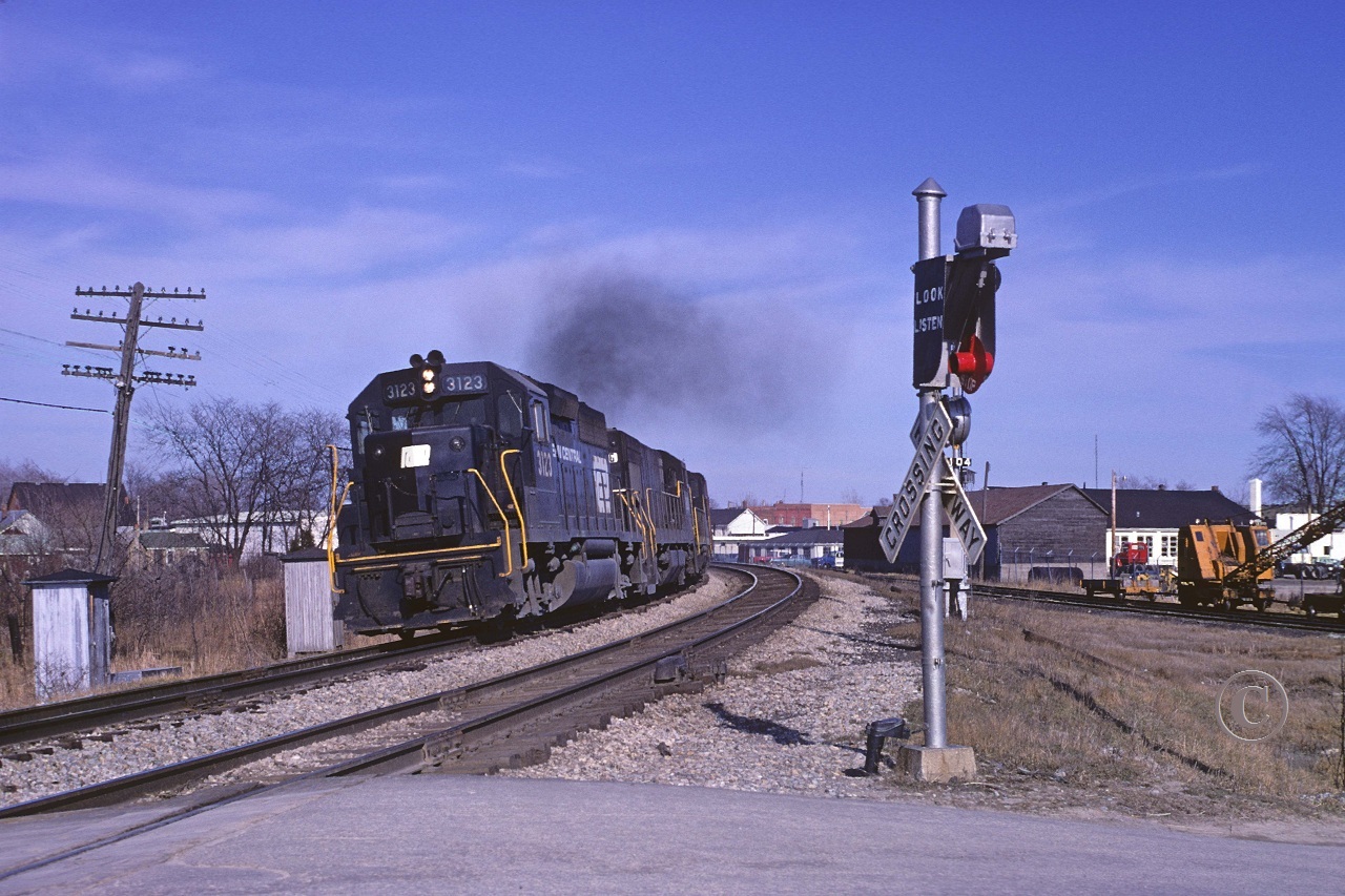 Penn Central 3123, with U.S. bound train LS3, charges westward through the elevated curve at mile 210.56 on the much storied CASO Sub April 12, 1970.