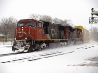 CN 331 passing the east end of the Brantford Yard with CN 5655 - CN 8804 and 46 cars on this snowy December morning. O/S @ 11:33.