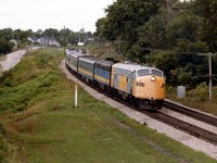 Back in the summer of 1980, word got around that VIA was testing a new paint scheme. And on this overcast August day the opportunity to capture an image of this one-of-a-kind made itself presentable. So here we have VIA 6532,6630 on an eastbound VIA #72, the leader in my opinion looking as nondescript as the weather. I don't know how long this scheme adorned 6532, but I never saw it again.
Photo taken in the company of fellow Railpictures contributor James Adeney, who also captured this scene,  next to the old John Ave overpass in Paris, Ont., gasp, over 32 years ago already.