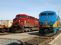 VIA 918 with Toronto to Ottawa train 44 prepares to get underway while CP 9553 with train 231 waits on a crew change at Smiths Falls.