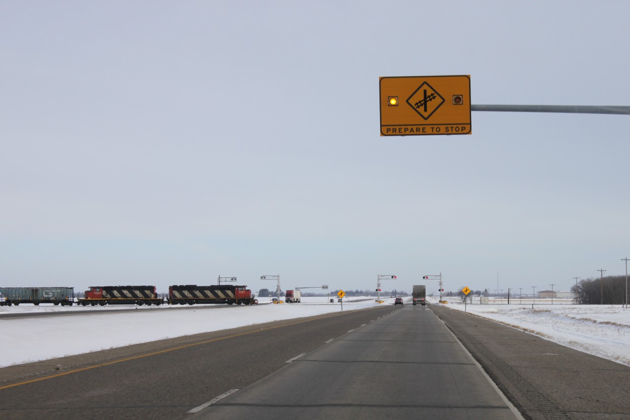 CN 405 crosses the Trans-Canada Highway before making it's way through Carberry.