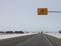 CN 405 crosses the Trans-Canada Highway before making it's way through Carberry.