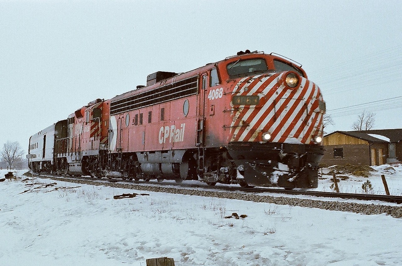 CP Rail FP7-A 4068 and GP-9 8528 power CP Rail train #11 - 'The Canadian' - on the approach to Bolton, January 1978 Kodak Kodakcolor II negative by S.Danko.