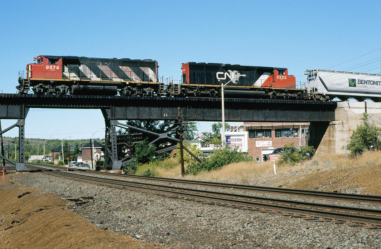 CN 9574, with the 594, passing over the CP Cartier sub at Sudbury, ONT.   9/15/2002