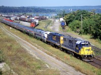 Desperate times call for desperate measures. Amtrak 823 kicked the bucket on the Maple Leaf the day before, and a pair of GP38-2s from CSX’s Frontier Yard in Buffalo was summoned to power the train to Toronto. The following  day, the pair of CSX units are seen leading the eastbound back towards Buffalo, passing SOR’s Stuart Street yard in Hamilton. 