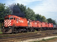 Late in their careers, four CP MLW’s smoke it up on 509 departing London. These locomotives haven’t fared too well. CP 4240 went to the Morristown & Erie and was later scrapped, CP 1825 went to the Minnesota Commercial but doesn’t seem to get much use, CP 4242 went to the Arkansas & Missouri and has been used as a parts source, and CP 4216 also went to the Morristown & Erie where it sits stored, covered in graffiti.