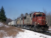 CP 388 has swung south at Guelph Junction and is about to cross Sideroad 3 as it begins down the Hamilton Sub.