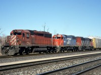 CN 231 pulls out of Aldershot Yard with an interesting mix of CN power.