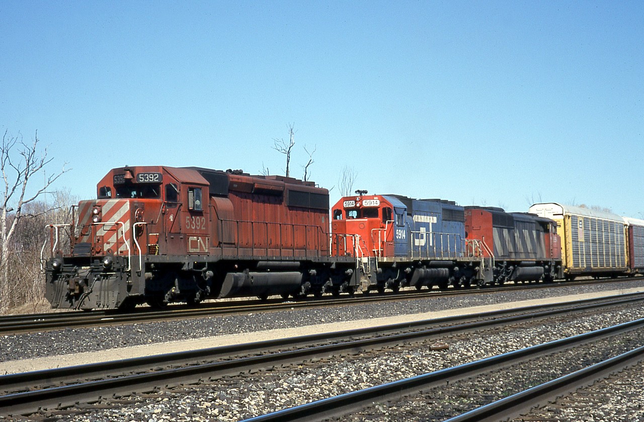 CN 231 pulls out of Aldershot Yard with an interesting mix of CN power.