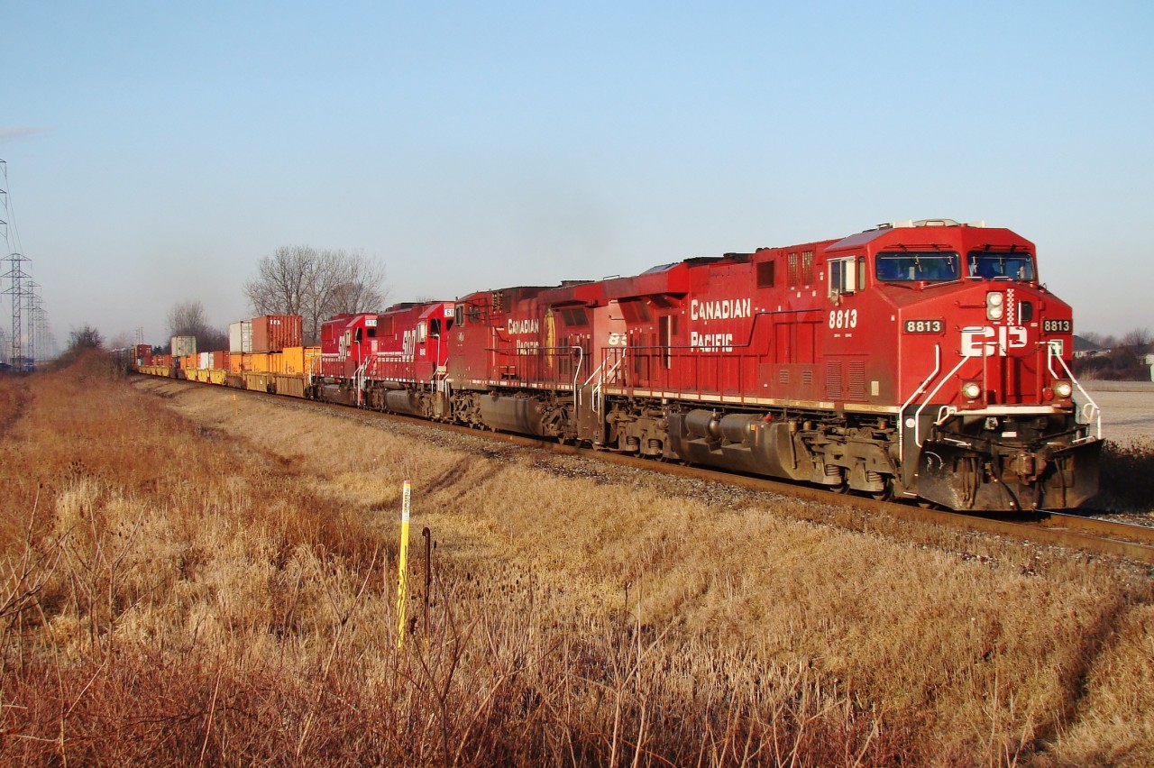 Here we have CP train 282 flying past Manning rd. at track speed just outside of Windsor. The two trailing SOO's (6047 & 6048) are two of the last remaining in SOO paint and are most likely headed to CAD for rebuild.