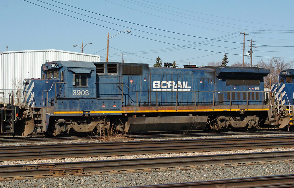 For maybe around two months in 2010, BCOL 3903 and 3904 were stored in the Walker yard dead-line. Although they are sequentially numbered, they both have a different background. 3903 started life as GECX 8002, while 3904 as LMX 8555. You can tell the difference from the headlight and ditchlight placement.

They have both since been retired, sold Aug-Sep. 2012.