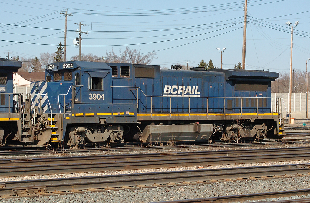 For maybe around two months in 2010, BCOL 3903 and 3904 were stored in the Walker yard dead-line. Although they are sequentially numbered, they both have a different background. 3903 started life as GECX 8002, while 3904 as LMX 8555. You can tell the difference from the headlight and ditchlight placement. They have both since been retired, sold Aug-Sep. 2012.