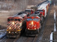 331 with BCOL 4616 - CN 2159 waits for a signal back to it's train as 393 overtakes them with CN 5713 - CN 2172