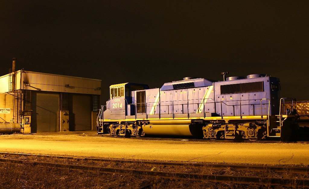 CEFX 2014 sits in the light of a near by street lamp in front of the SOR shops at Hamilton yard. I've seen many photos of this engine and it's sisters being used up in Hagersville or Nanticoke, but I'm assuming it was moved down hear for maintanence of 90-day inspection.