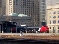 CN Grey Cup extra train sits outside the east end of Union Station with CN 103 - CN 102 and coaches CN 1057, CN 1061, IC 800210, CN 1058, CN 1059 and CN 1060