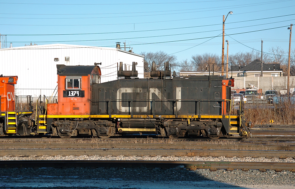 As of January 2013, This unit has been sitting in Walker for almost exactly two years now. If I rememember correctly, the unit was returned the start of 2011 from a company who was using it as an industrial switcher.  The company did some unauthorized modification by adding "handrails" on the top of the unit. If anyone has more info it would be appreciated.