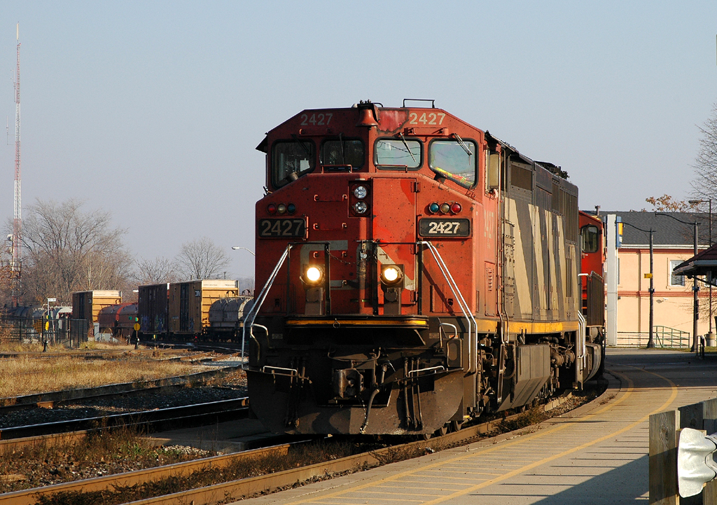 331 rolls around the curve at Brantford with CN 2427 - CN 5754 on the head end