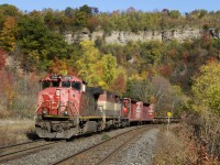 Autumn in Southern Ontario last year brought out some spectacular foliage, as evidenced in this photo as CN 435 gets a grip on the hill at Dundas with an interesting trio of power.