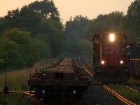 CN 4776 rolls past it's train after crossing over at Hardy. Soon it will be on it's way down the Hagersville sub to Nanticoke