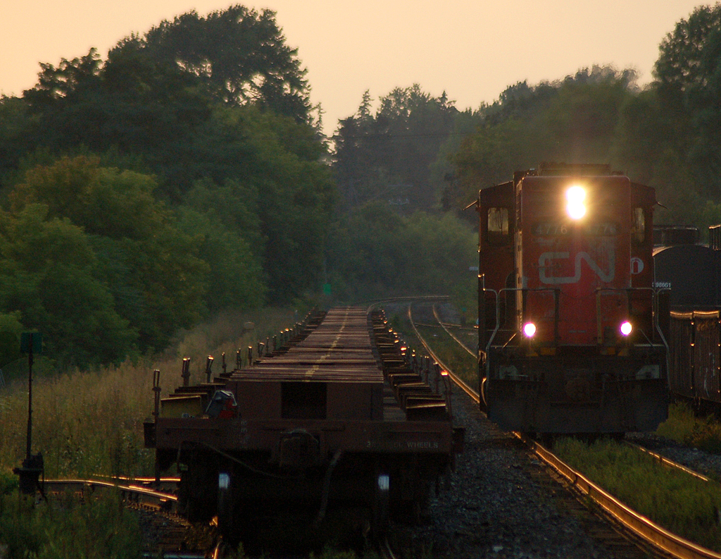 CN 4776 rolls past it's train after crossing over at Hardy. Soon it will be on it's way down the Hagersville sub to Nanticoke