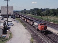 CN 9648 leads an eastbound ballast train through Aldershot