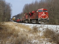 Perhaps one of the reasons that CP's Hamilton Subdivision remains a very seldom photographed line between Hamilton and Guelph Junction is because of the lack of trains and the timing in which they run. The last time that I was able to shoot a southbound in good lighting from this location was back in November 2011. Ever since then I have tried to catch a southbound train here before the afternoon but luck did not permit until this morning. CP 246, a Sudbury-Buffalo train is seen approaching the 7th Concession East grade crossing at Mile 69 on the Hamilton Sub on a frigid but sunny  January morning. After all this time it was nice to once again shoot a SB in some good morning light.