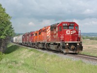 A heck of a consist for this little branchline train - CP SD40-2s 6015 & 6011, GP9u 8221, GP38-2 3035 and matching control cab 1125, and finally GP38-2 3118. This consist brought the train to Dow at Prentiss, and then the SD40-2s were left in front of the Lacombe viterra terminal with the Dow train while the other 4 units continued the journey Eastward onto the Lacombe sub.
