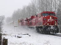 242 dashing through the snow towards it's next stop at Ayr with CP 8887 - CP 8853