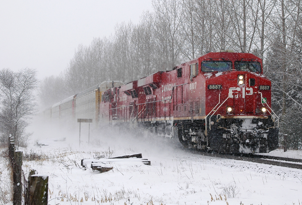 242 dashing through the snow towards it's next stop at Ayr with CP 8887 - CP 8853