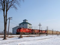 CP 9374-241, with CP 9827 and 8538, roll past the grain elevator turned office tower at Elmstead mile 101 on the CP's Windsor Sub. 