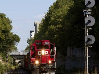 Trundling along century old trackage in the heart of Hamilton, CP 8216 leads a trio of GP9s and 8 cars for the old TH&B Aberdeen yard with work to be done.