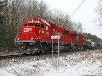 A clean CP 6234 is westbound on CP train 235 one mile west of Pender on the Galt Sub. They will set off 47 multies at W. Coke before continuing west to London.