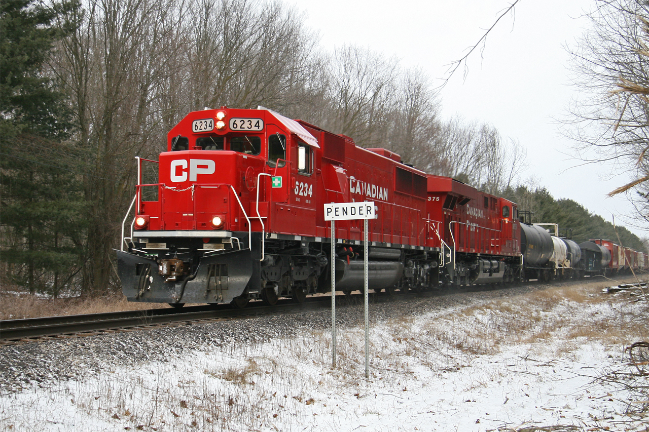 A clean CP 6234 is westbound on CP train 255 one mile west of Pender on the Galt Sub. 
They will set off 47 multies at W. Coke before continuing west to London.