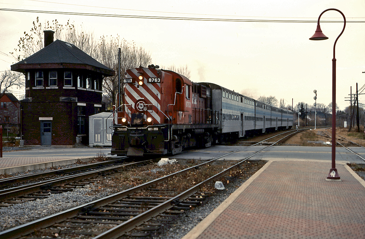 AMT 50 rolls into Montreal West behind CP 8763
