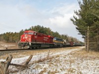 CP 8879 leads a westbound over the HBD one mile west of Pender on the Galt Sub. Photo is from Oxford Rd 4 just NE of Woodstock, ON.