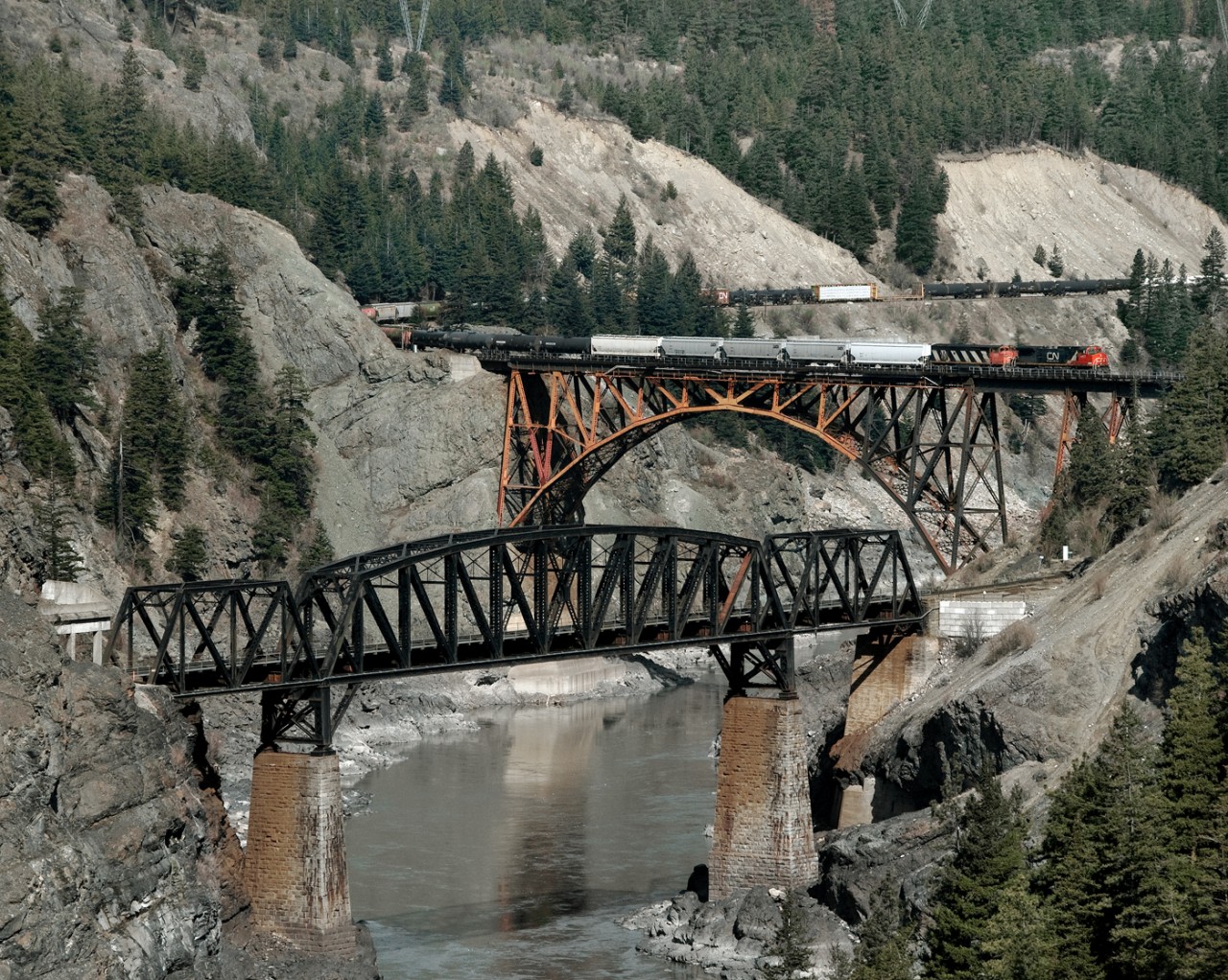 Westbound CN 416 changes sides with the CP in the Fraser canyon west of Lytton near Cisco Siding. All westbounds use the CN while Eastwards use the CP who's bridge is below the CN.