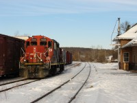 CN 4132 sits quiet in the yard at Huntsville enjoying the sunset after a trip down to Longford and back. Once a busy station connecting Southern, Central and Northern Ontario, it's not hard to tell passenger service has disappeared on the North end with the platform snow covered and fairly undisturbed. 