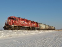 CP T76 led by former D&H sister units 7310 & 7309, heads back towards Walkerville on a frigid sunny afternoon after just passing by the grain elevator at Haycroft.