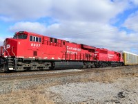 CP 235 led by 8937 & 6231, goes in the siding at Tilbury to clear for an oncoming eastbound. This is 6231's maiden voyage after just being rebuilt, repainted and released from CAD in Montreal. 6231 used to be SOO 6031