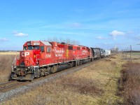 Led by a pair of ex D&H GP38-2's, CP T76 heads westbound past where once was the location of Ringold Station.