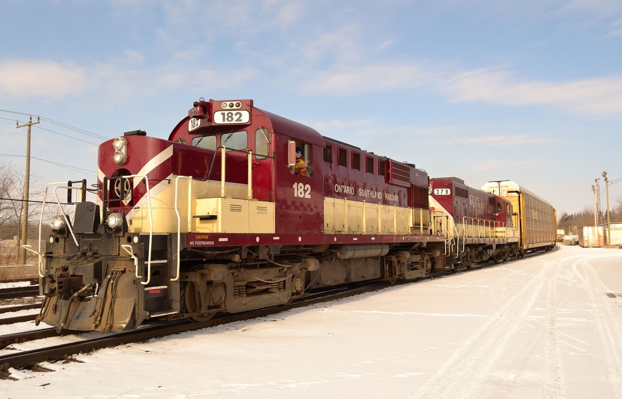 The OSR Woodstock Job passes by the station after lifting a 4500' cut of autoracks at West Coak. Fellow RP contributor Tyler MacNeill in the conductors seat.
