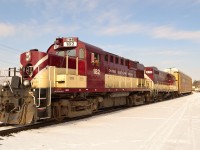 The OSR Woodstock Job passes by the station after lifting a 4500' cut of autoracks at West Coak. Fellow RP contributor Tyler MacNeill in the conductors seat.