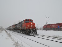 Nice timing, as I was able to capture this CN-CP meet at Dorval. The CN eastbound is powered by CN 2696, BCOL 4626 & CN 2130, while the CP empty oil train heads west, led by CP 9352.