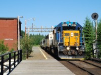 The southbound Northlander arrives in Swastika to drop off one passenger. A classic Ontario Northland scene. 