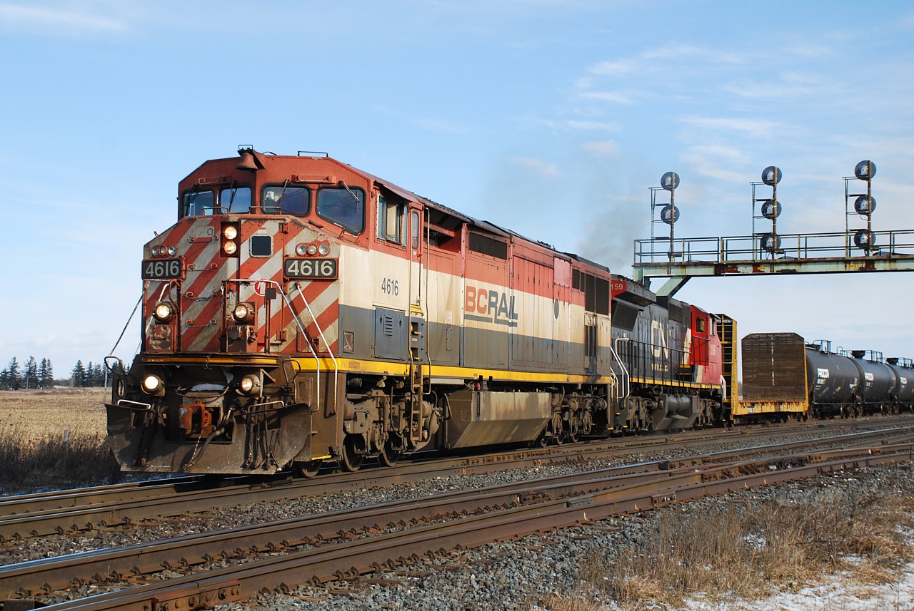 Dirty, faded paint, missing marker lights... BCOL 4616 has seen better days, but it was still a nice catch leading 331 today, seen here lifting SOR interchange traffic out of the north service track at Paris West.